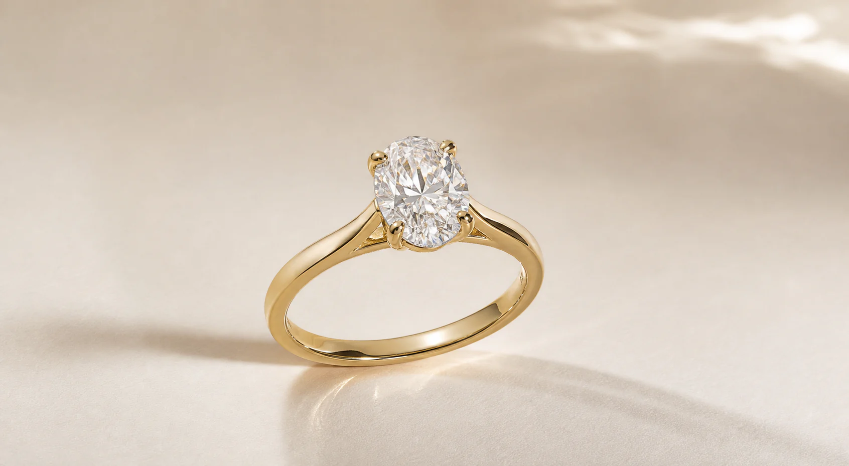 Gold oval lab-grown diamond ring with customizable setting and metal finish
